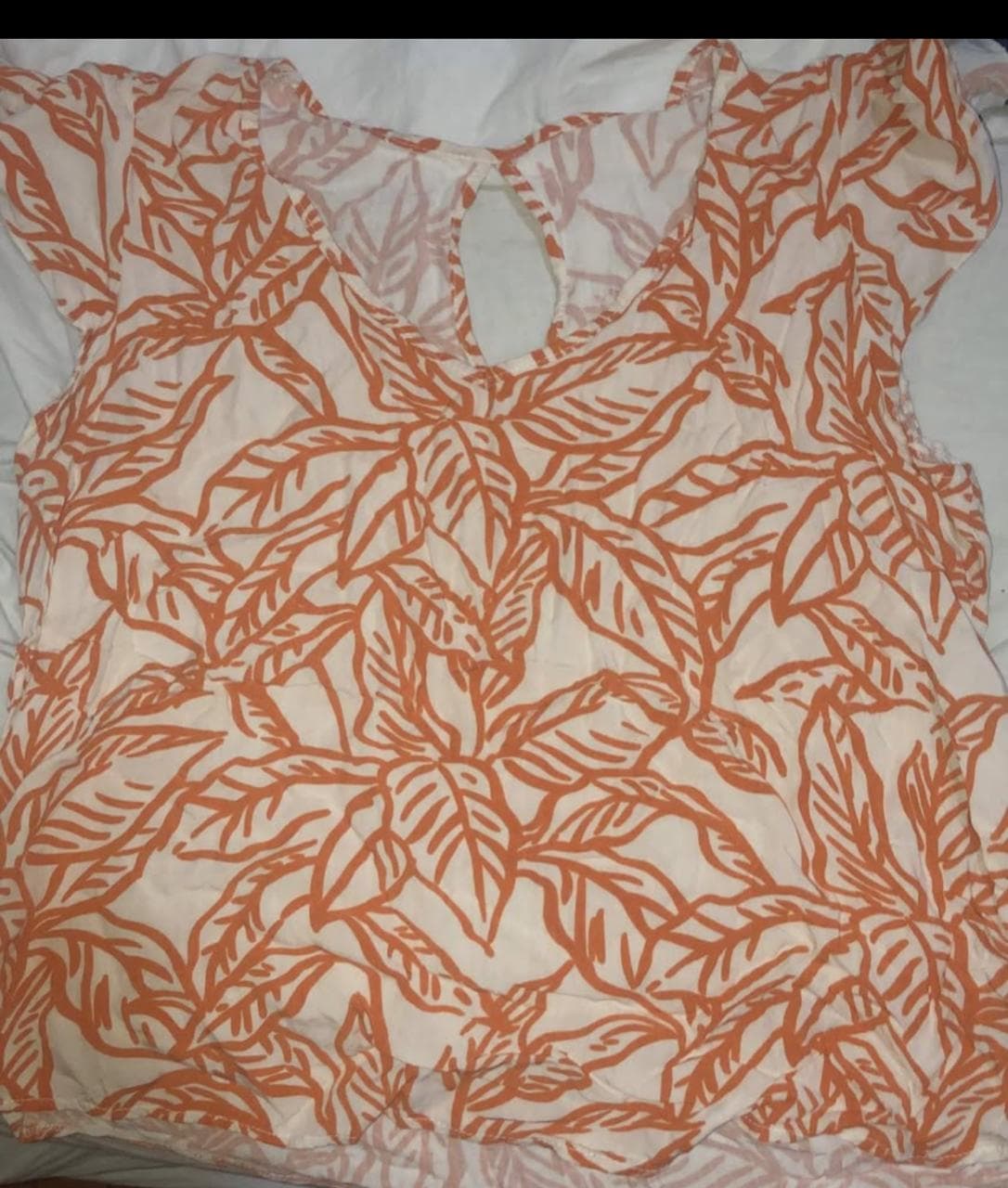 Blusa estampa naranja y blanco
